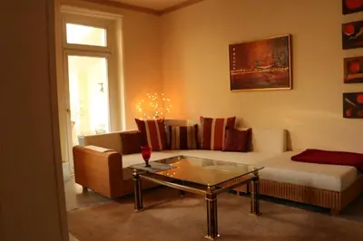 Ein Sitzbereich in der Unterkunft Apartment mit Gartenblick und kleines Apartment im 3 Familienhaus