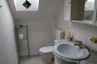 Ein Badezimmer in der Unterkunft Apartment mit Gartenblick und kleines Apartment im 3 Familienhaus