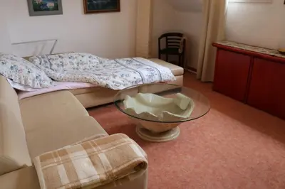 Ein Bett oder Betten in einem Zimmer der Unterkunft Apartment mit Gartenblick und kleines Apartment im 3 Familienhaus
