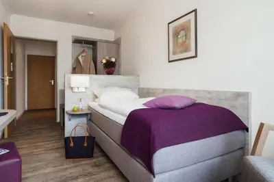 Ein Bett oder Betten in einem Zimmer der Unterkunft Sengelmannshof