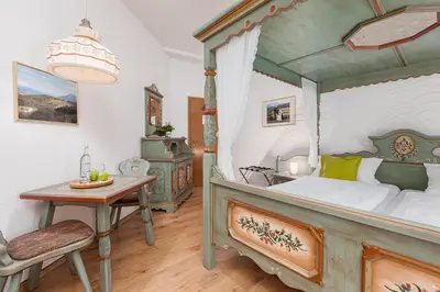 Ein Bett oder Betten in einem Zimmer der Unterkunft Hotel Landgasthof Hölzer