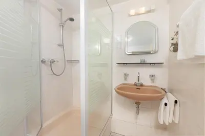 Ein Badezimmer in der Unterkunft Hotel Landgasthof Hölzer