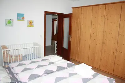 Ein Bett oder Betten in einem Zimmer der Unterkunft Fewo Lirich