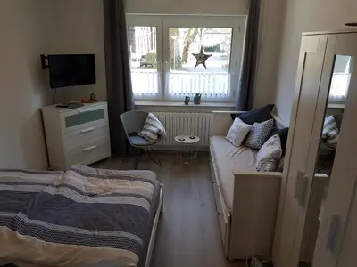Ein Bett oder Betten in einem Zimmer der Unterkunft Ferienwohnung Veit