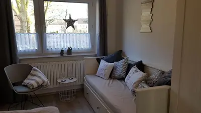 Ein Sitzbereich in der Unterkunft Ferienwohnung Veit