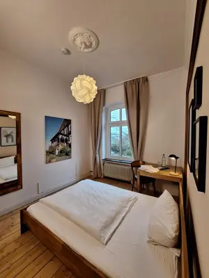 Ein Bett oder Betten in einem Zimmer der Unterkunft Alte Schmiede