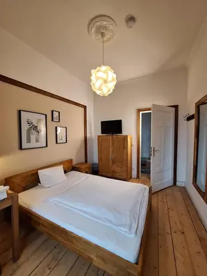 Ein Bett oder Betten in einem Zimmer der Unterkunft Alte Schmiede