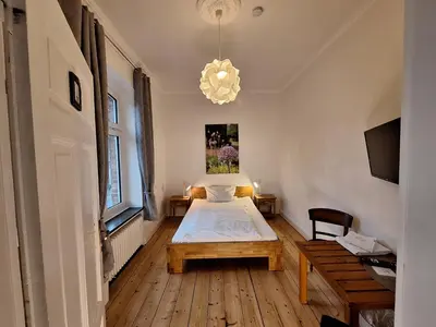 Ein Bett oder Betten in einem Zimmer der Unterkunft Alte Schmiede