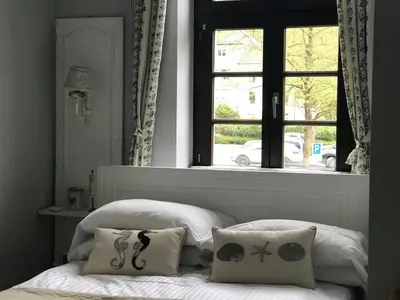 Ein Bett oder Betten in einem Zimmer der Unterkunft Bürgerhaus Langenberg
