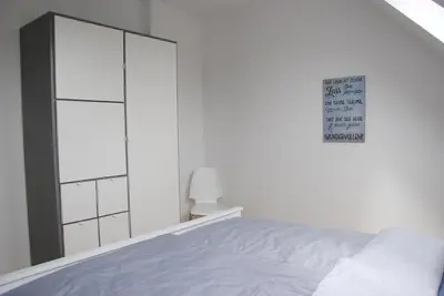 Ein Bett oder Betten in einem Zimmer der Unterkunft Glück Auf im Pott