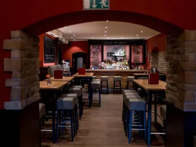Ein Restaurant oder anderes Speiselokal in der Unterkunft Parkhotel Herne