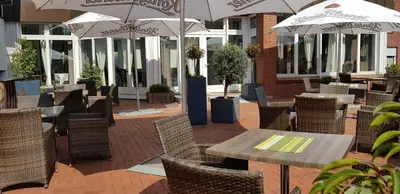Ein Restaurant oder anderes Speiselokal in der Unterkunft AKZENT Hotel Merfelder Hof
