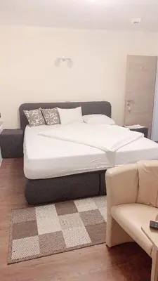 Ein Bett oder Betten in einem Zimmer der Unterkunft Hotel-Restaurant Haus Nattkemper