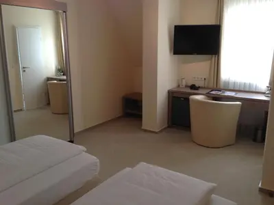 Ein Bett oder Betten in einem Zimmer der Unterkunft Hotel Destination 21