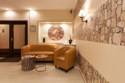 Ein Sitzbereich in der Unterkunft Hotel Angerland Garni
