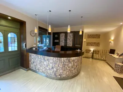 Ein Sitzbereich in der Unterkunft Hotel Angerland Garni