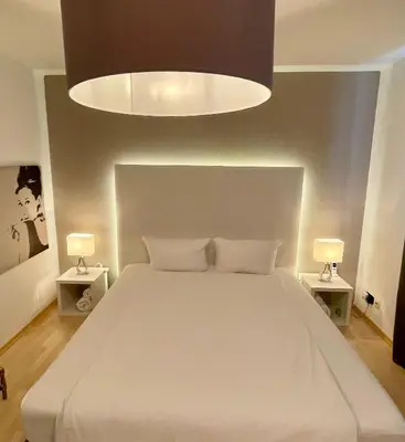 Ein Bett oder Betten in einem Zimmer der Unterkunft smart&beautiful Deluxe