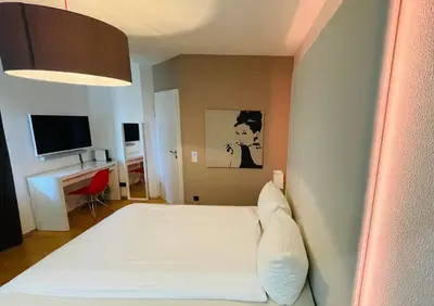 Ein Bett oder Betten in einem Zimmer der Unterkunft smart&beautiful Deluxe