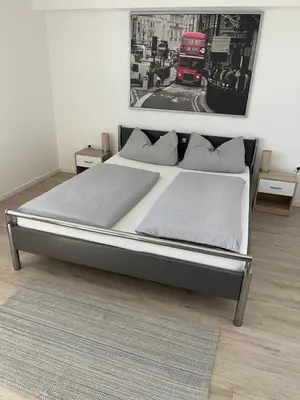 Ein Bett oder Betten in einem Zimmer der Unterkunft Idyllische, separate FeWo im Dortmunder Süden