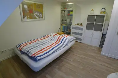 Ein Bett oder Betten in einem Zimmer der Unterkunft Altes Krupphaus auf der Heimaterde
