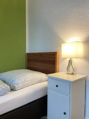 Ein Bett oder Betten in einem Zimmer der Unterkunft Apartmenthaus Sonnen