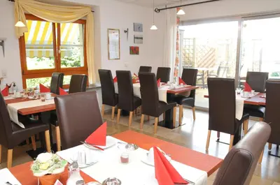 Ein Sitzbereich in der Unterkunft Pension Bella Vista