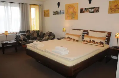 Ein Bett oder Betten in einem Zimmer der Unterkunft Pension Bella Vista