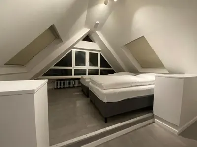 Ein Bett oder Betten in einem Zimmer der Unterkunft Oldtown Apartments Mühlenstr