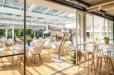 Ein Restaurant oder anderes Speiselokal in der Unterkunft Fettehenne Gästehaus