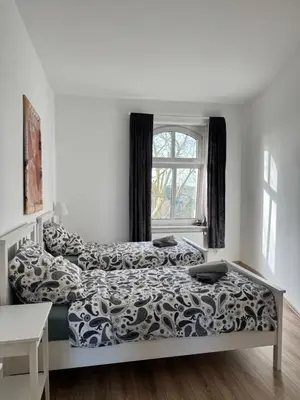 Ein Bett oder Betten in einem Zimmer der Unterkunft Schöne 3-Zimmer Wohnung im Herzen von Wuppertal