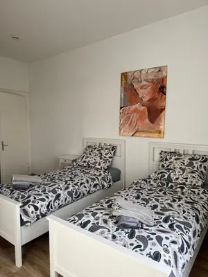 Ein Bett oder Betten in einem Zimmer der Unterkunft Schöne 3-Zimmer Wohnung im Herzen von Wuppertal
