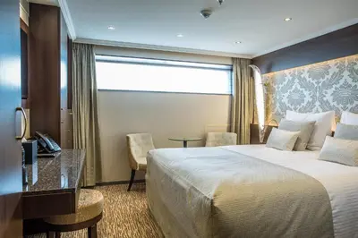 Ein Bett oder Betten in einem Zimmer der Unterkunft VIVA RIVERSIDE Altstadt Düsseldorf