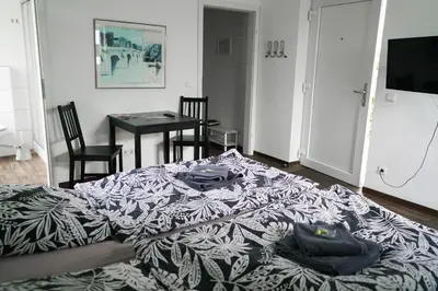 Ein Bett oder Betten in einem Zimmer der Unterkunft Hostel Nordkirchen by Frerichmann
