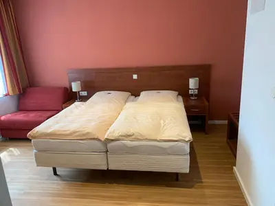 Ein Bett oder Betten in einem Zimmer der Unterkunft Hotel Restaurant zur Post