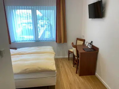 Ein Bett oder Betten in einem Zimmer der Unterkunft Hotel Restaurant zur Post