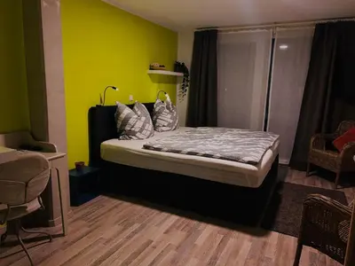 Ein Bett oder Betten in einem Zimmer der Unterkunft Pension Osthoff