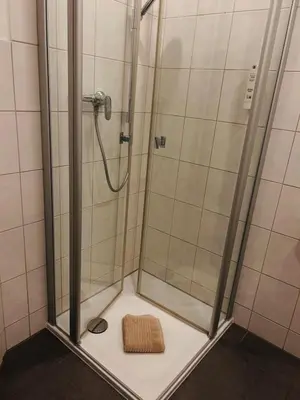 Ein Badezimmer in der Unterkunft Pension Osthoff