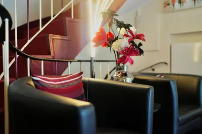 Ein Sitzbereich in der Unterkunft Hotel Imperial