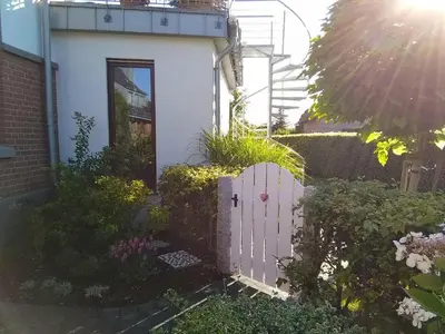 Ein Garten an der Unterkunft Ferienwohnung Spatzennest