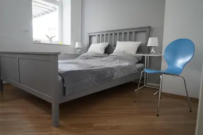 Ein Bett oder Betten in einem Zimmer der Unterkunft Altstadtwohnung mit eigenem Hauseingang