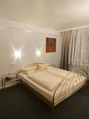 Ein Bett oder Betten in einem Zimmer der Unterkunft Luise City - An der Philharmonie