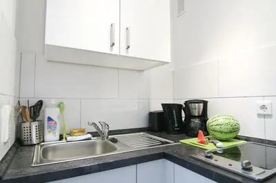Küche/Küchenzeile in der Unterkunft apartmondo Monteurapartments