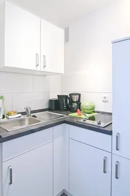 Küche/Küchenzeile in der Unterkunft apartmondo Monteurapartments