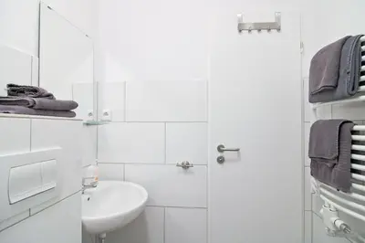 Ein Badezimmer in der Unterkunft apartmondo Monteurapartments
