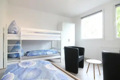 Ein Bett oder Betten in einem Zimmer der Unterkunft apartmondo Monteurapartments