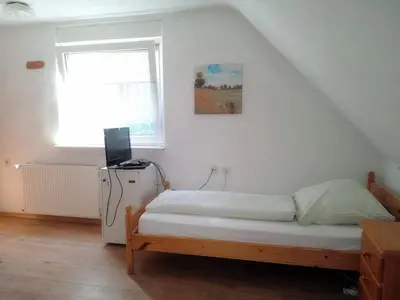 Ein Bett oder Betten in einem Zimmer der Unterkunft Hotel Hohenstein -Radweg-Messe-Baldeneysee