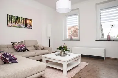 Ein Sitzbereich in der Unterkunft Ferienwohnung am Freizeitpark Bärenloch