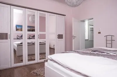 Ein Bett oder Betten in einem Zimmer der Unterkunft Ferienwohnung am Freizeitpark Bärenloch