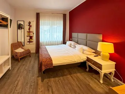 Ein Bett oder Betten in einem Zimmer der Unterkunft Trip Inn Boutique Rubens