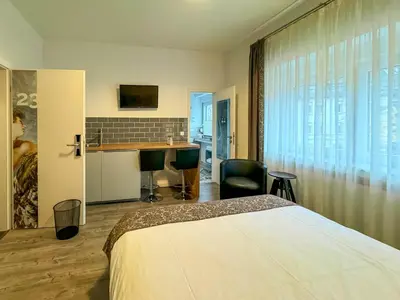 Ein Bett oder Betten in einem Zimmer der Unterkunft Trip Inn Boutique Rubens